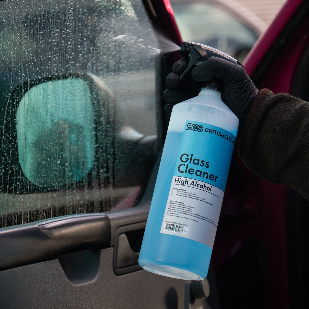 BCS Glass Cleaner being sprayed onto car side window
