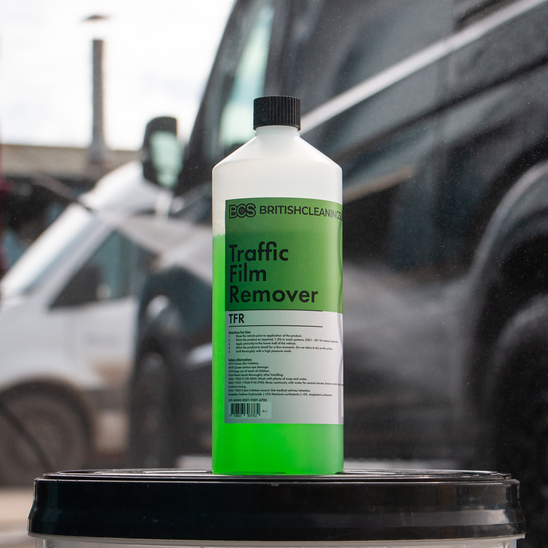 Van being washed behind bottle of BCS Traffic Film Remover