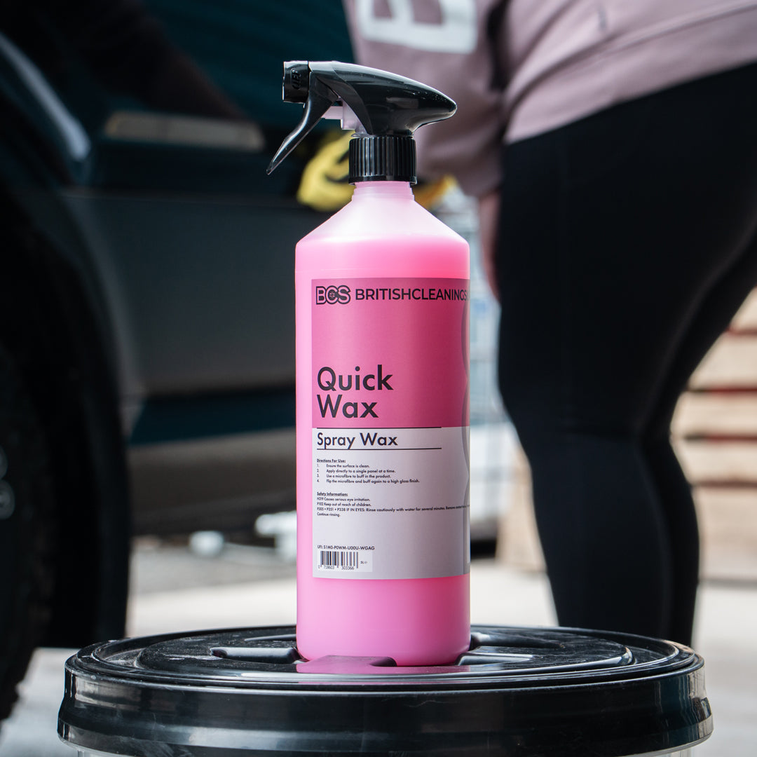 Person adding protection to vans paint behind BCS Quick Wax